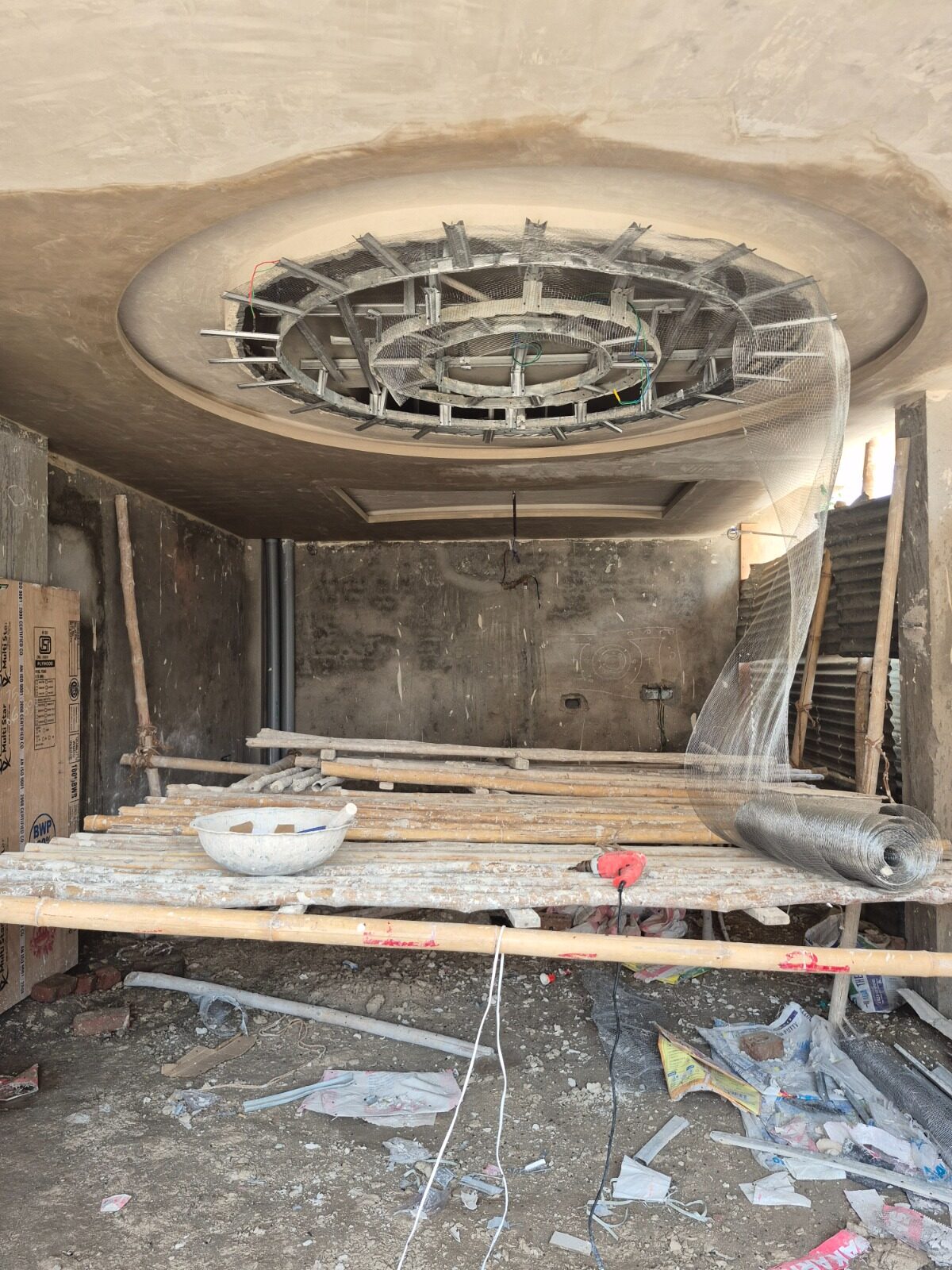 Raw ceiling framework mid-construction for a future crystal chandelier installation