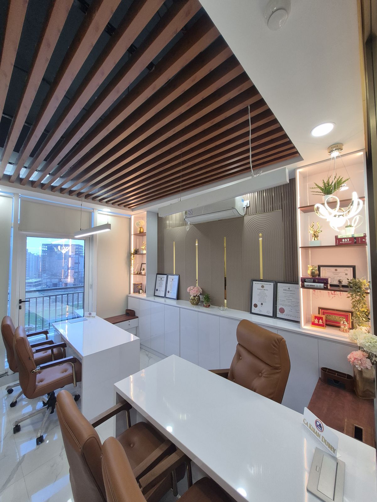 Office cafeteria seating with a mural feature wall