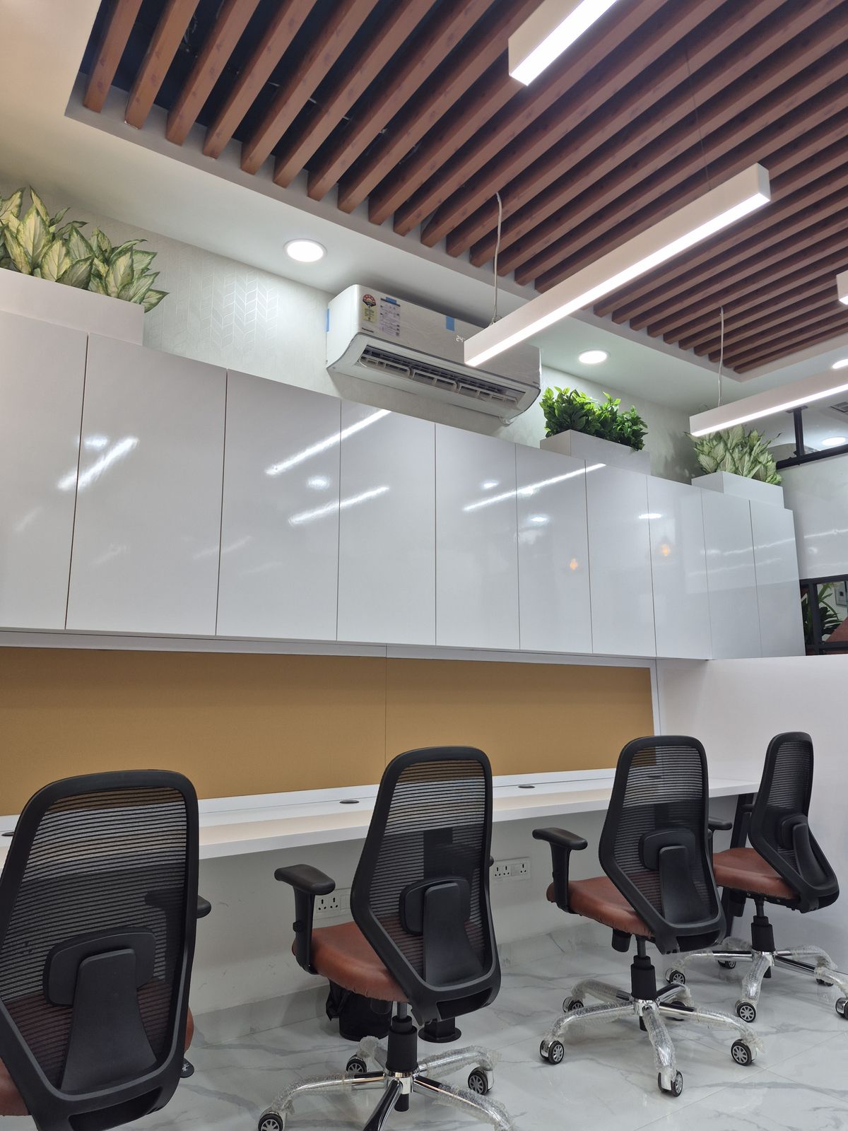 Conference room with a boardroom table and glass walls