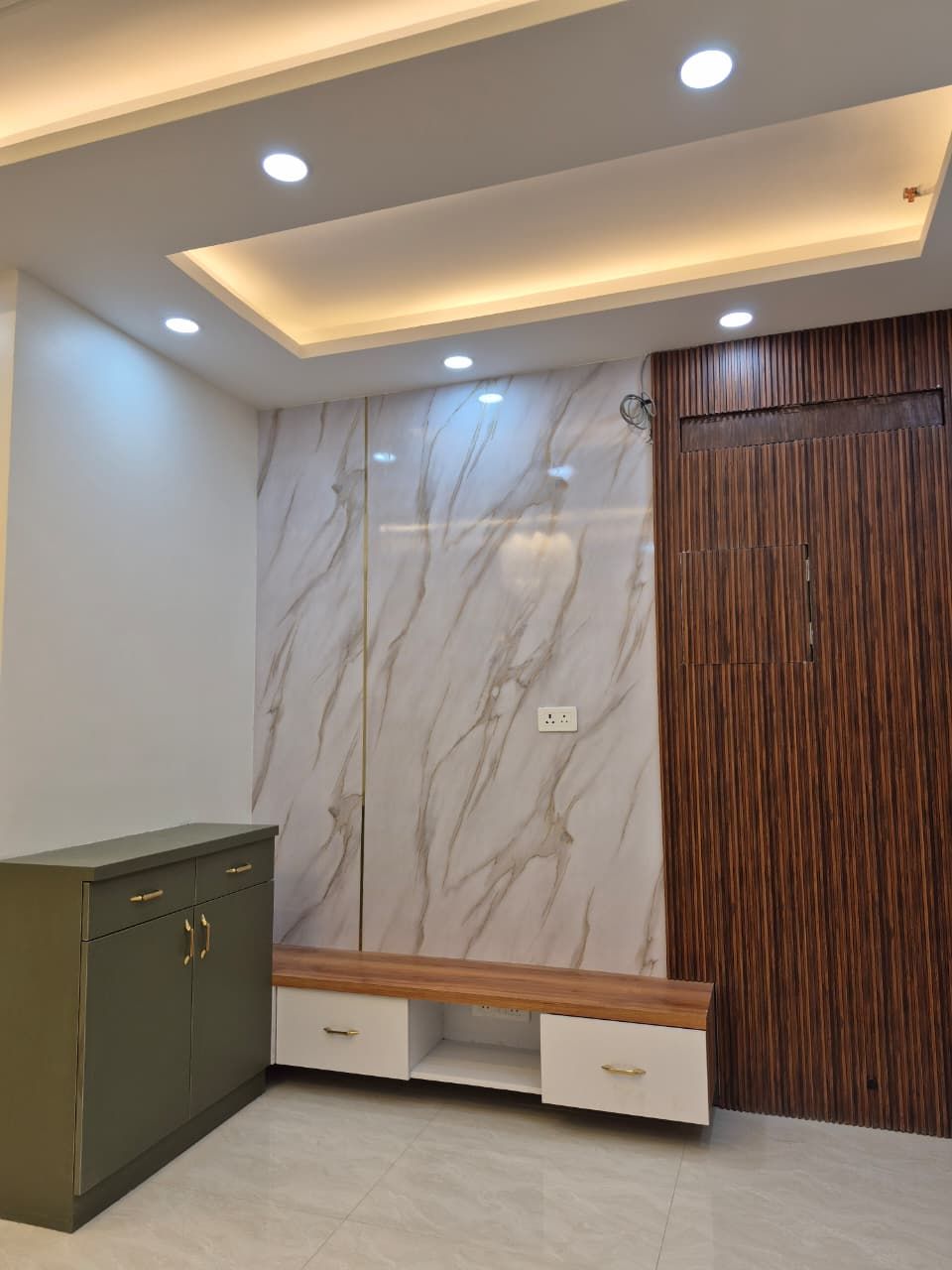 Kitchen with utility access, tall units and integrated lighting