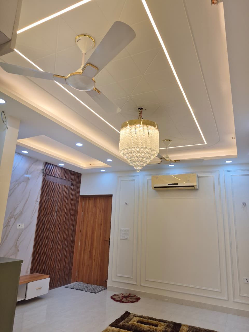 Full-height wardrobe with an integrated dressing unit and pendant lights